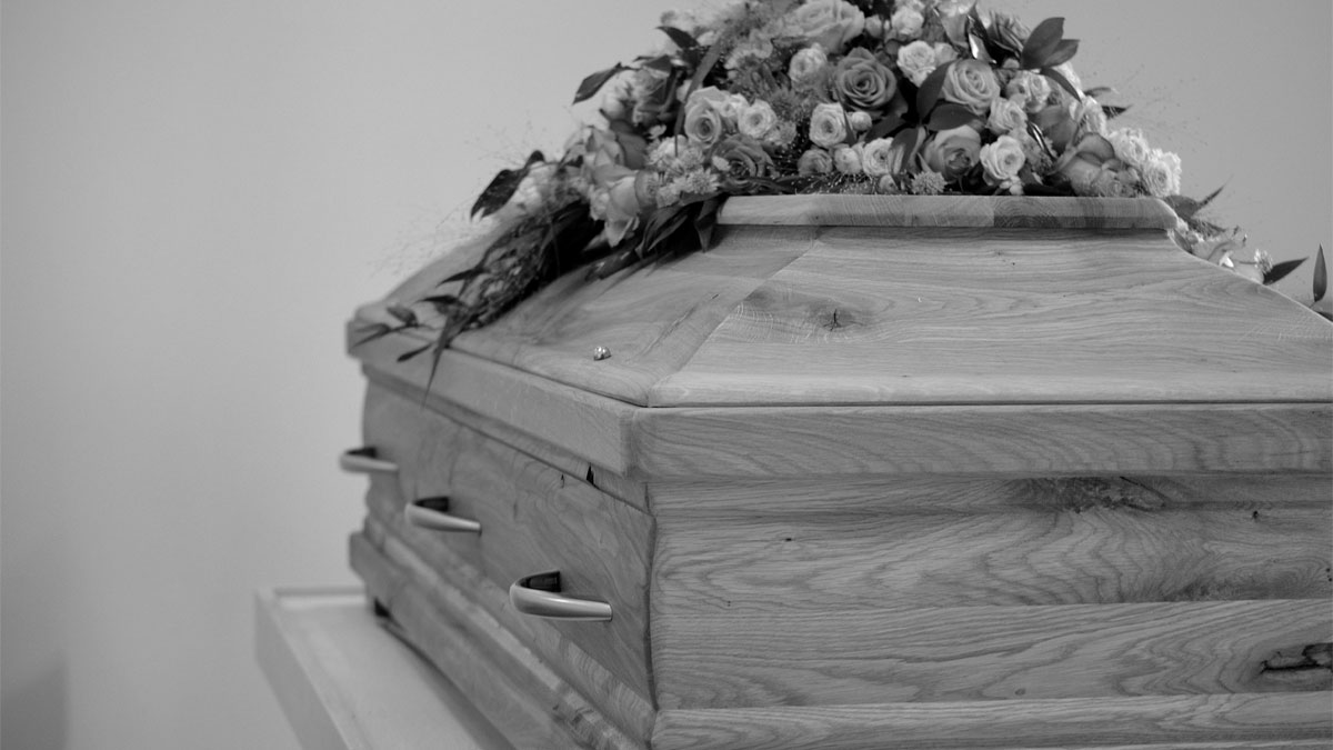 In Loving Rest: The Casket’s Silent Conversation with Laughter and Love
